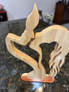 handcrafted wood couple art
