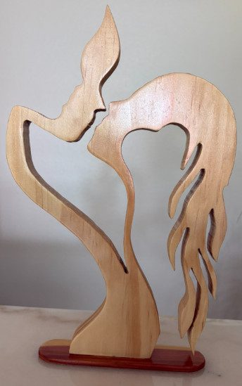 handcrafted wood couple art