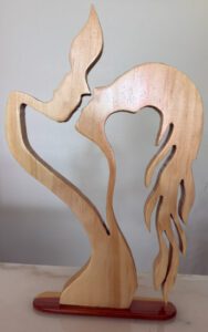 handcrafted wood couple art